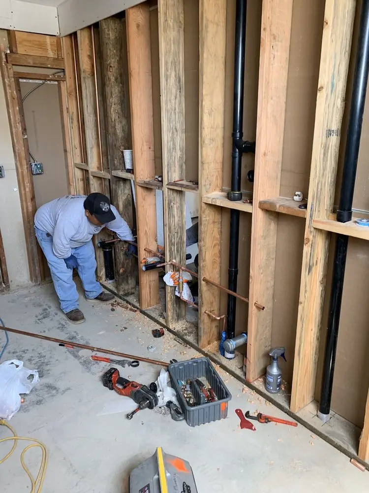 Commercial rough-in plumbing for Water Heater Replacement in Newton